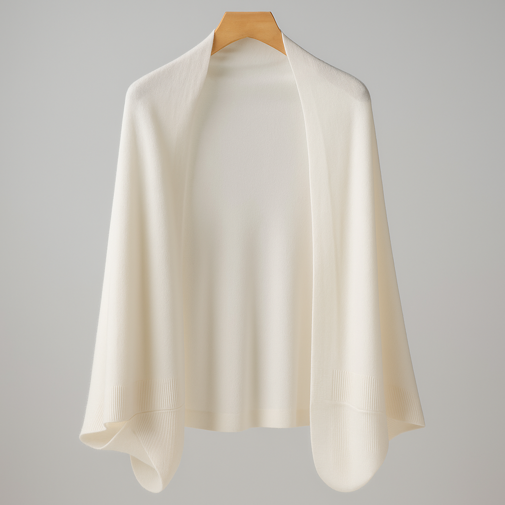 Maja - Wełniany, narzutkowy sweter z rzemieślniczymi akcentami